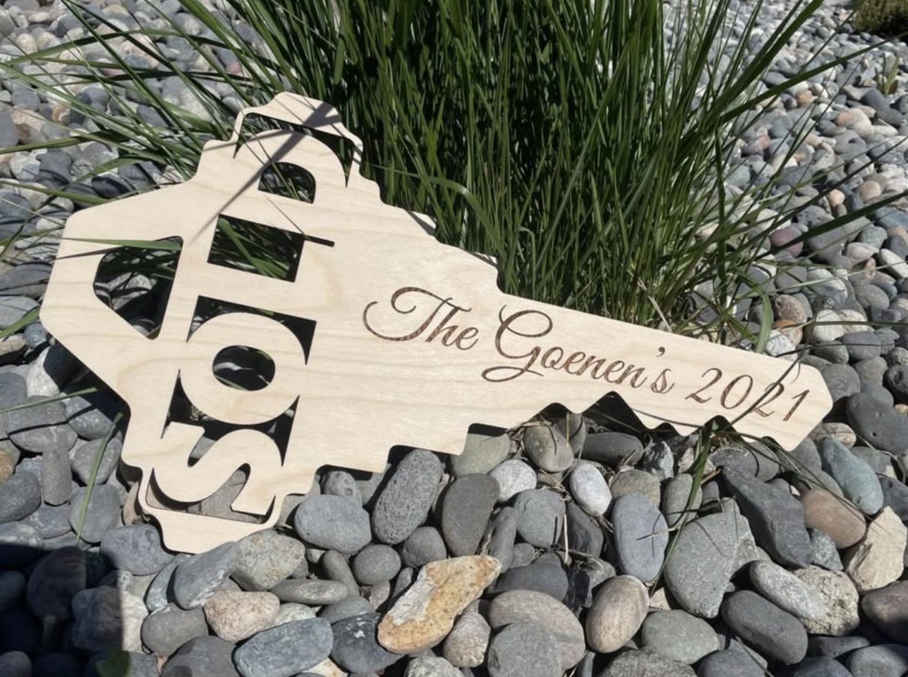 Laser-cut 'SOLD' realtor key sign engraved with 'The Goenen's 2021'.